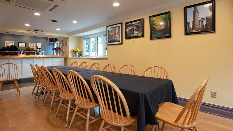 Party room with private bar and long dining table